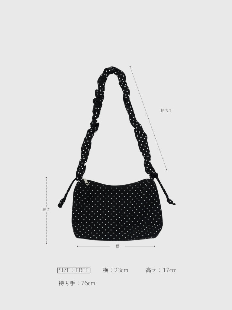 hirred handle polka dot bag