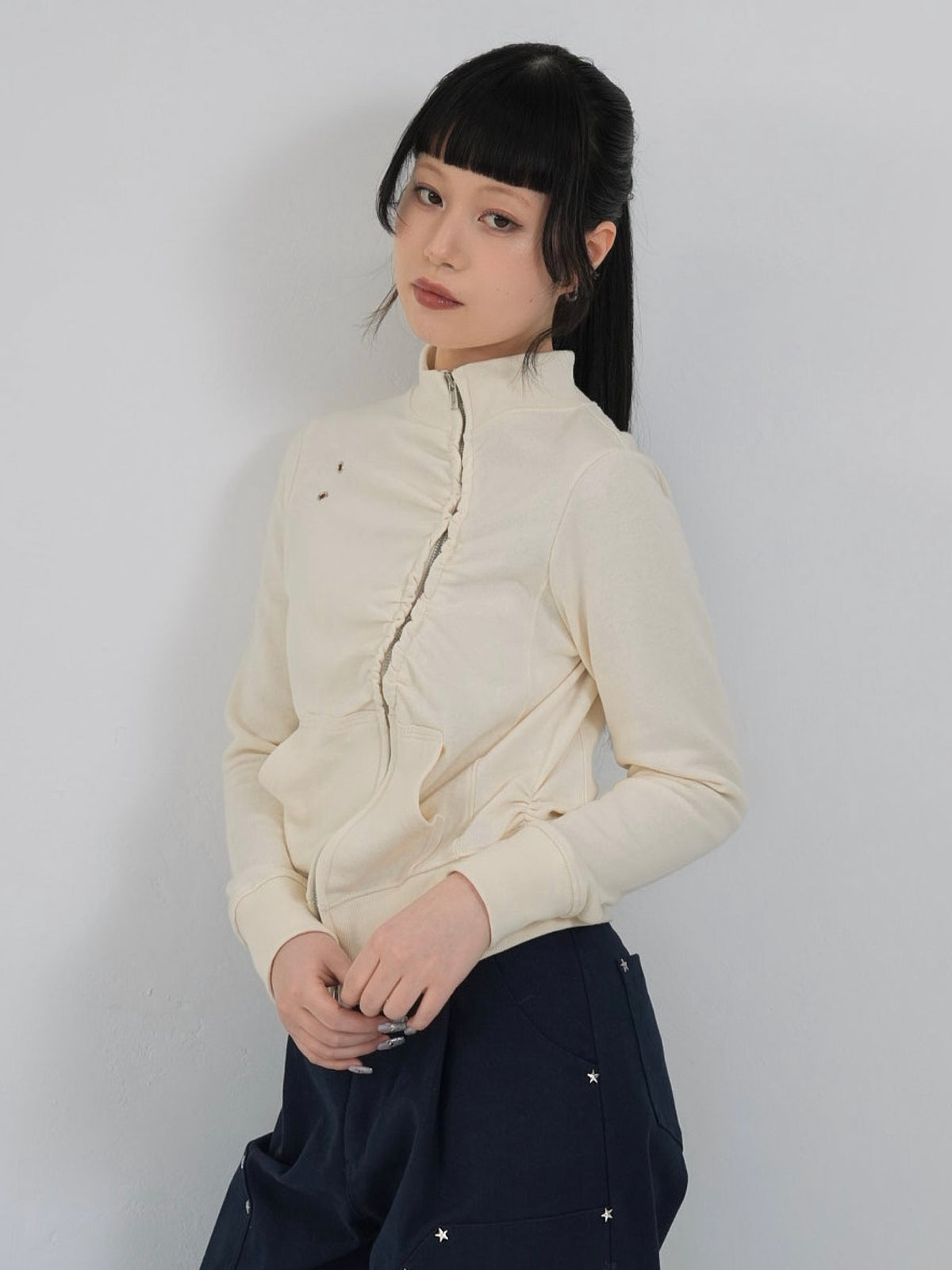 eyelet wave zip tops