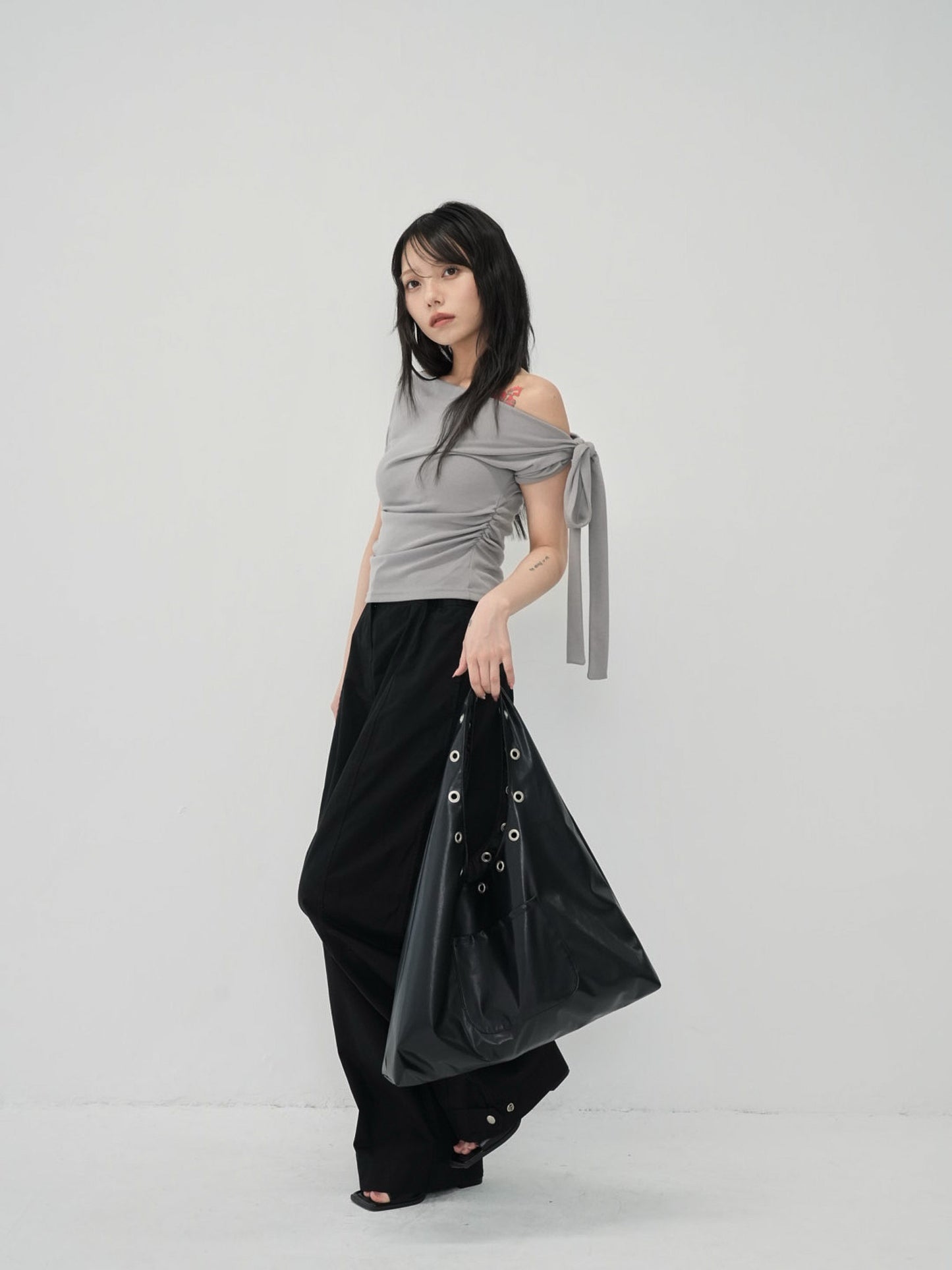 eyelet shoulder bag
