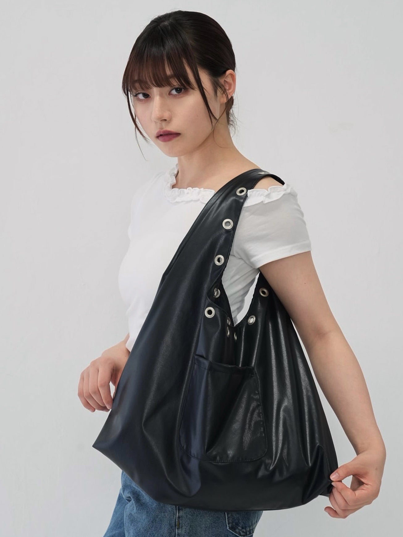 eyelet shoulder bag