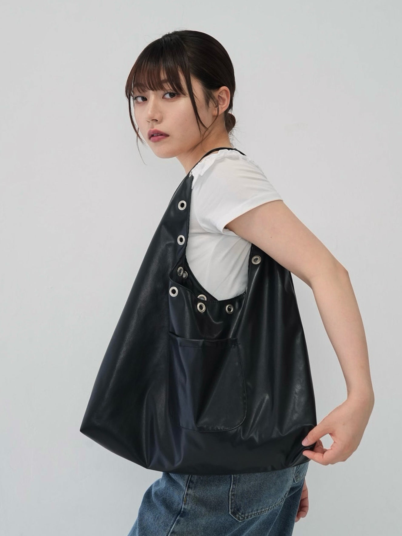 eyelet shoulder bag