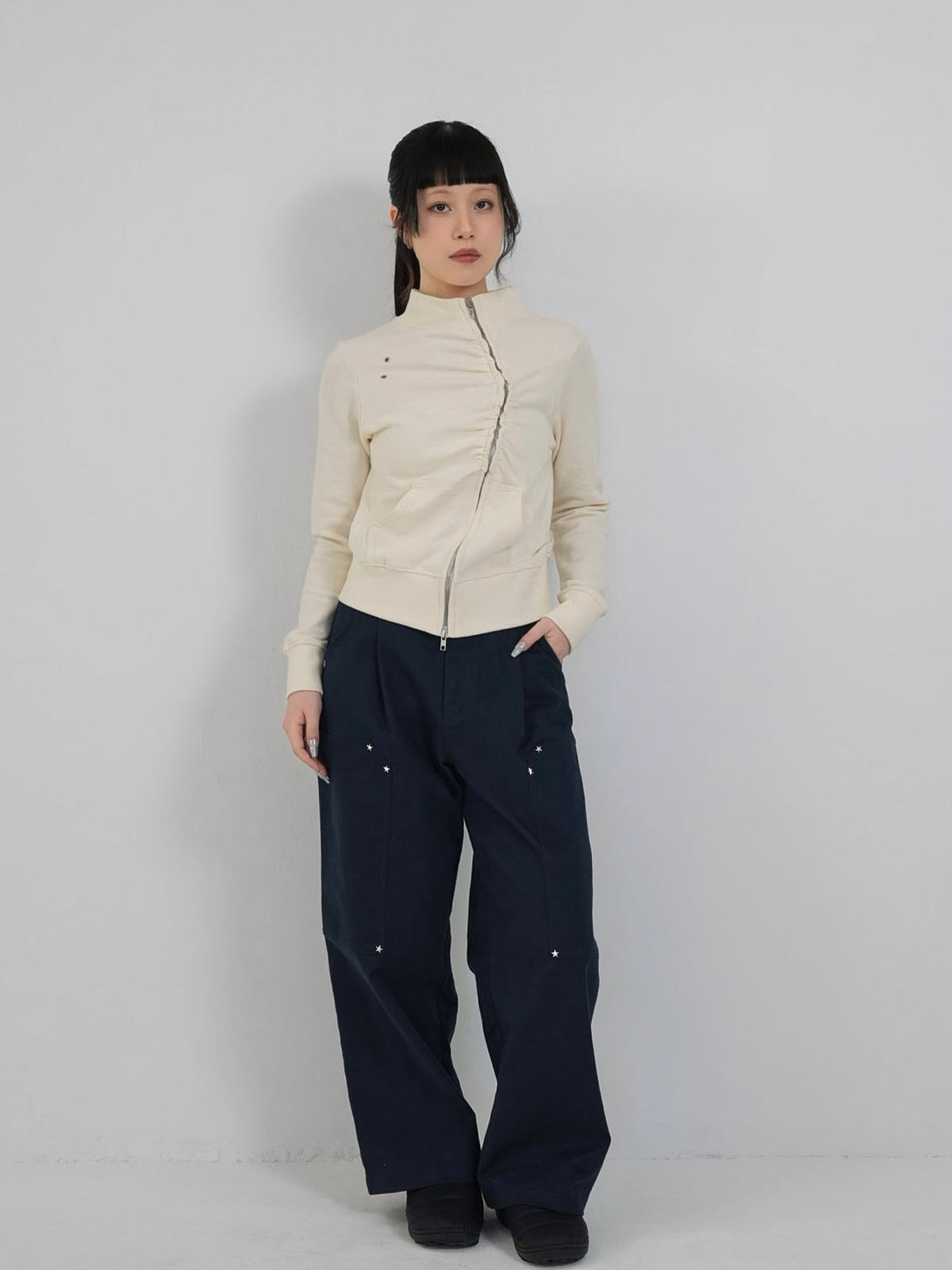 eyelet wave zip tops